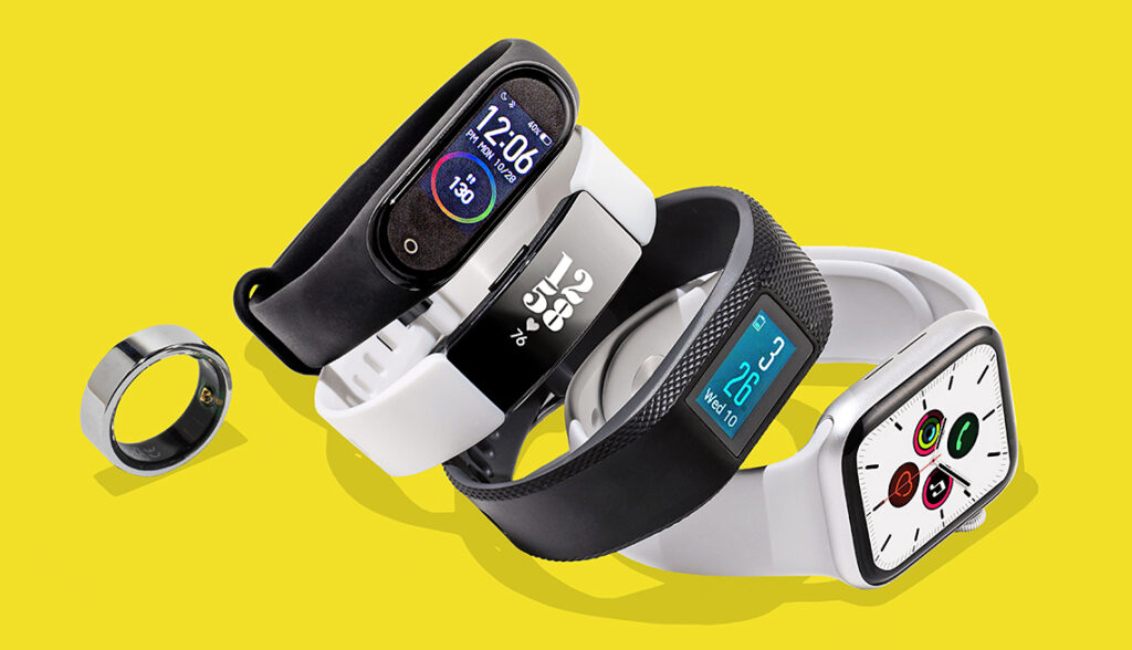 five types of fitness trackers are pictured. from left to right
